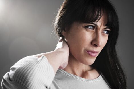 A woman has osteochondrosis on the neck